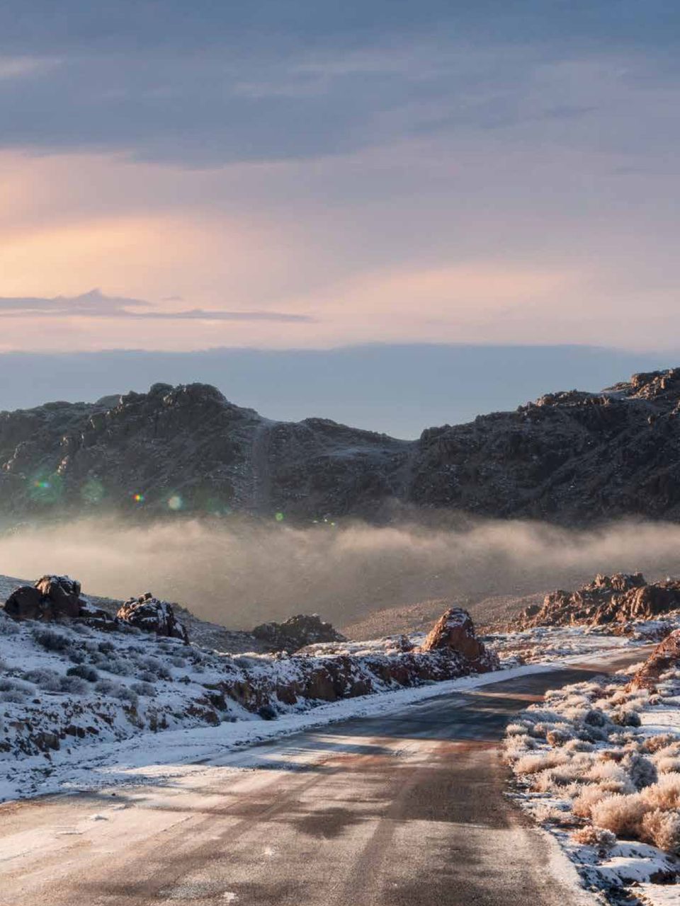 Snow-covered mountain road